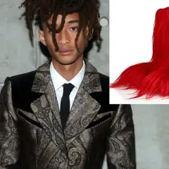 Jaden Smith, syn Willa Smitha, w ekstrawaganckim garniturze obok jaskrawoczerwonych, futrzanych butów.