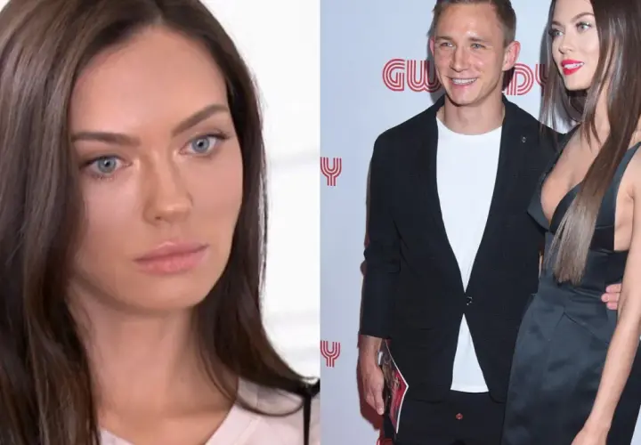 Edyta Zając Rzeźniczak w ciąży, uśmiechnięta z partnerem na ściance.