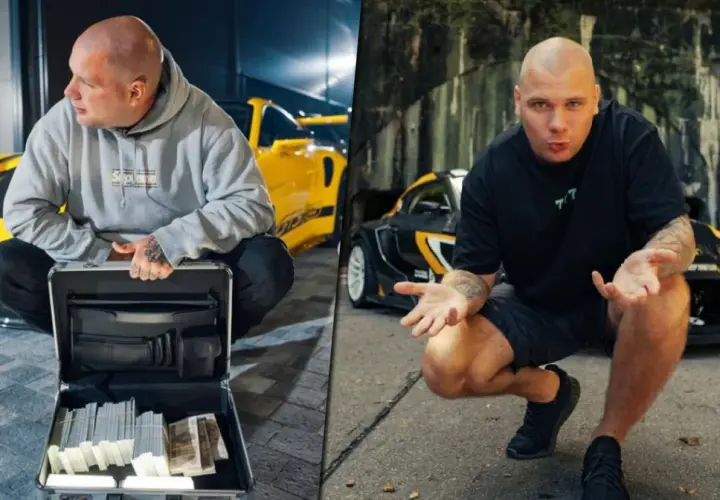 Kamil Labudda życiorys: łysy mężczyzna z tatuażami, w szarej bluzie i czarnej koszulce, z walizką pełną pieniędzy i sportowymi autami w tle.