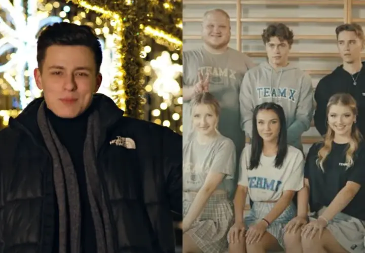 Młody mężczyzna przed świątecznymi iluminacjami i grupa osób w strojach z napisem TEAM X, jakby po obozie.
