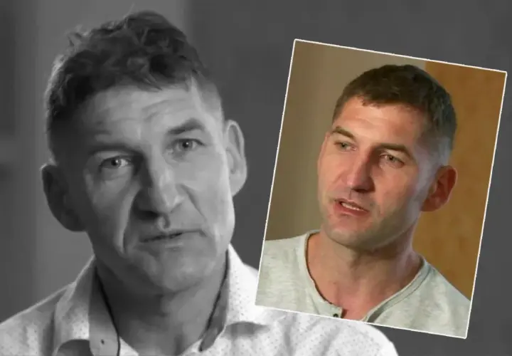 Elvis z "Chłopaki do wzięcia" w zbliżeniu. Mężczyzna o krótkich włosach i zmęczonym spojrzeniu.