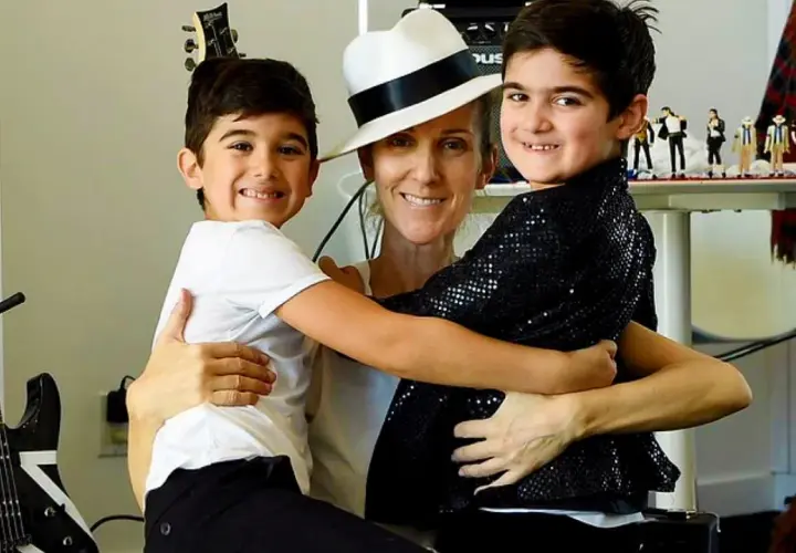 Celine Dion z synami, otoczona gitarami i figurkami Michaela Jacksona, celebruje muzyczne dziedzictwo.