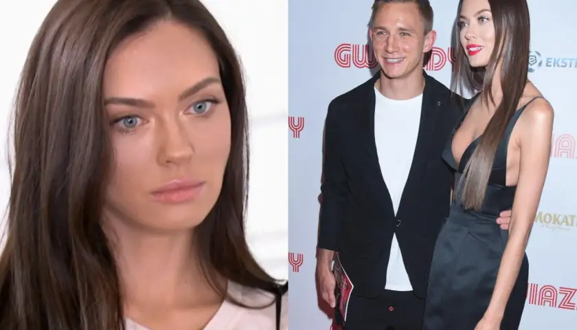Edyta Zając Rzeźniczak w ciąży, uśmiechnięta z partnerem na ściance.