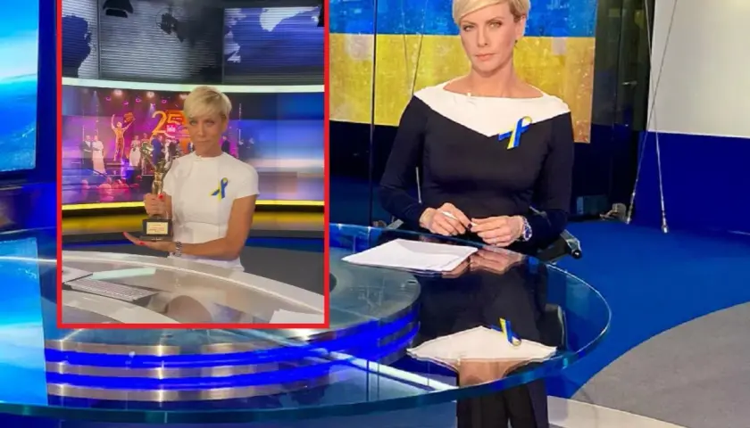 Dziennikarka TVN Fakty z nagrodą w studiu. W tle ekran z jubileuszem 25 lat.