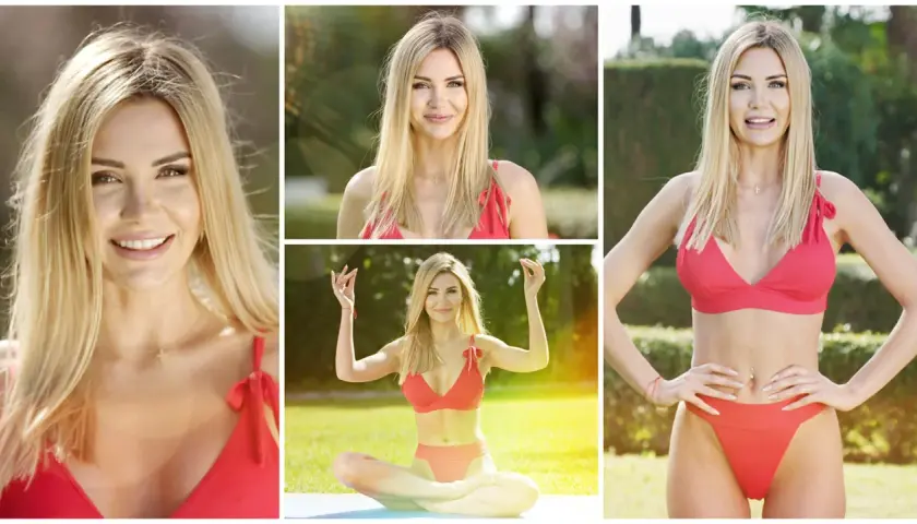 Angela z Love Island w czerwonym bikini, uśmiechnięta i w pozie medytacyjnej na tle zieleni.