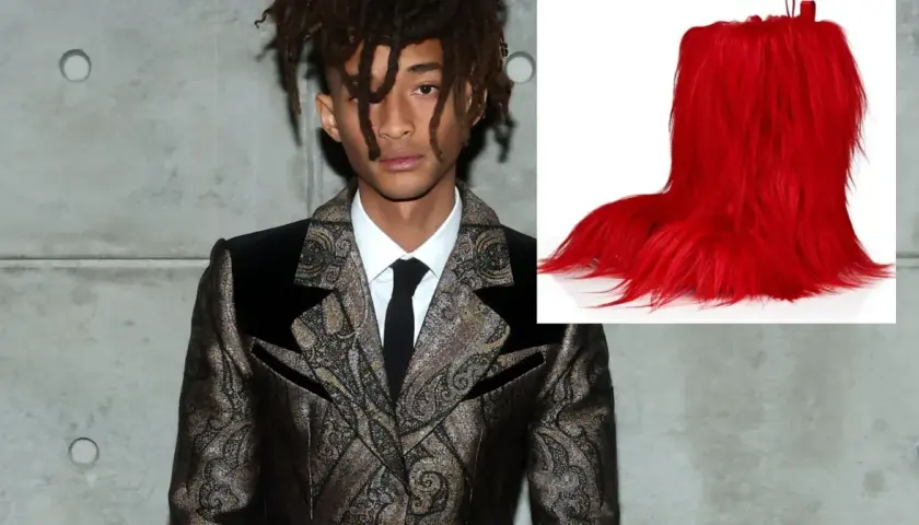 Jaden Smith, syn Willa Smitha, w ekstrawaganckim garniturze obok jaskrawoczerwonych, futrzanych butów.