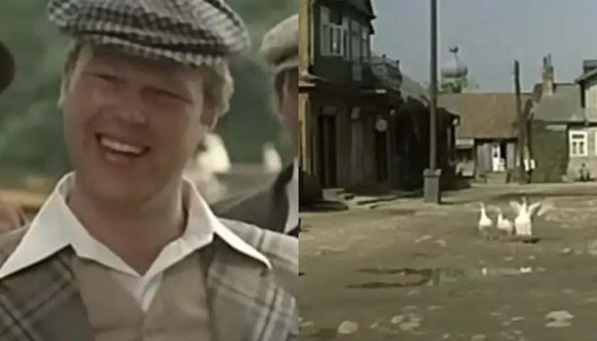 Uśmiechnięty Piotr Grabowski w kratkę, obok wiejska sceneria z gęsiami. Pytanie "piotr grabowski na co zmarł" pozostaje bez odpowiedzi.
