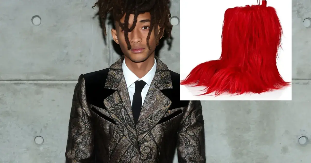 Jaden Smith, syn Willa Smitha, w ekstrawaganckim garniturze obok jaskrawoczerwonych, futrzanych butów.