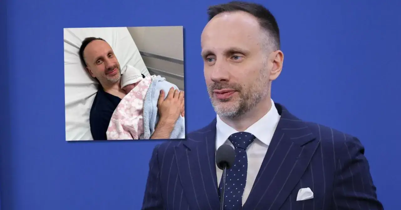 Janusz Kowalski z żoną i dziećmi: polityk trzyma noworodka, uśmiecha się do aparatu.